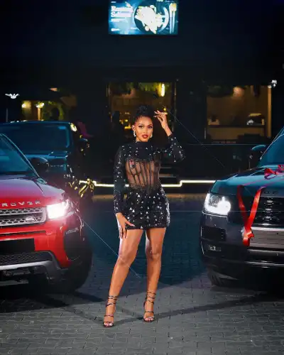 Braless Spice Diana Flaunts Boobs at New Range Rover Debut