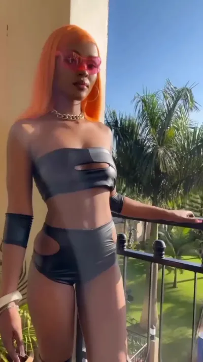 Kin Bella flaunts Butt Cheeks, Sexy Body in Tiny Latex Bikini Outfit