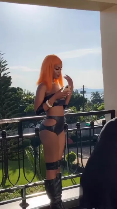 Kin Bella flaunts Butt Cheeks, Sexy Body in Tiny Latex Bikini Outfit