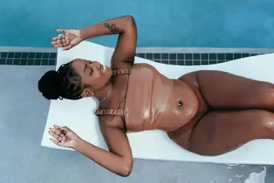 Wet Lydia Jazmine Shows of Sexy Body in Nude Leather Bikini